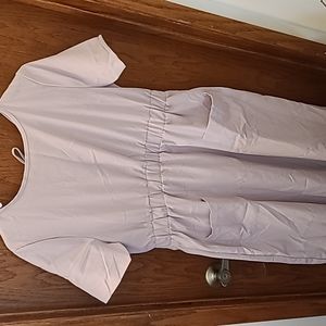 Tan women's dress with front pocket